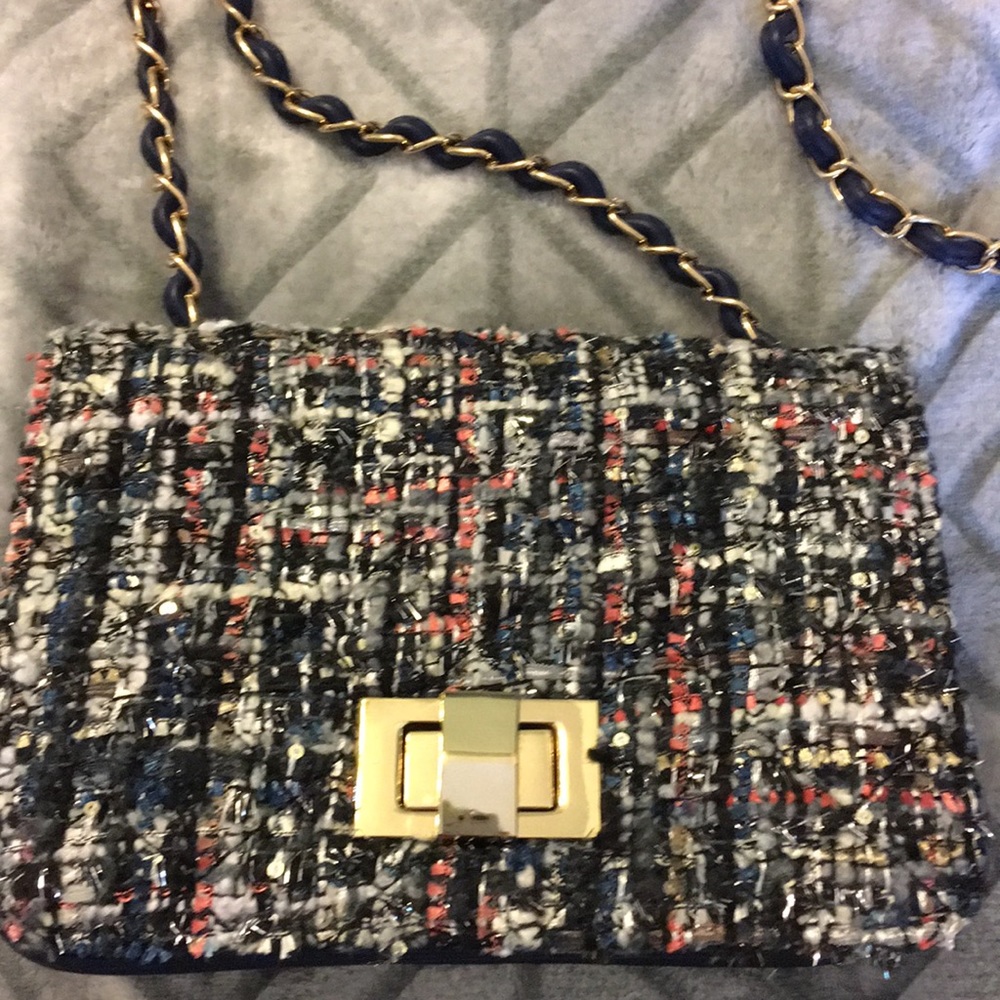 Chic tweed occasional handbag.